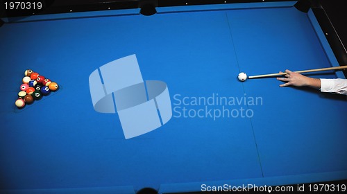 Image of young man play pro billiard game 