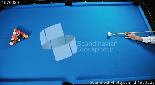 Image of young man play pro billiard game 