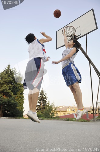 Image of woman basketball