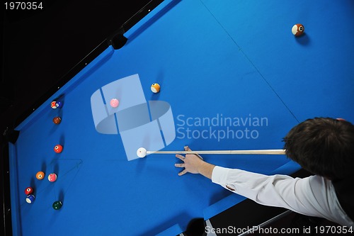 Image of young man play pro billiard game 