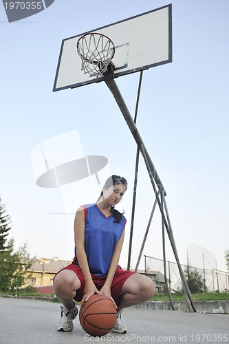 Image of woman basketball