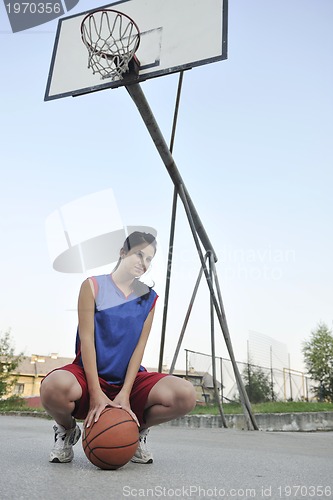 Image of woman basketball