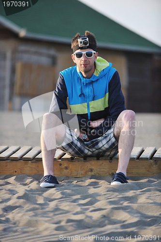 Image of man relax on beach