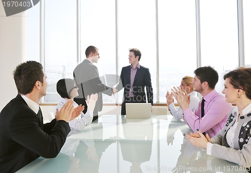 Image of group of business people at meeting