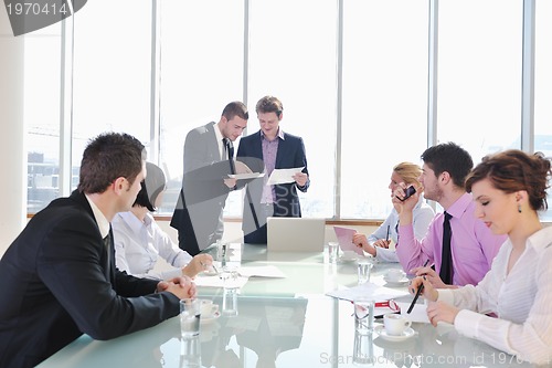 Image of group of business people at meeting