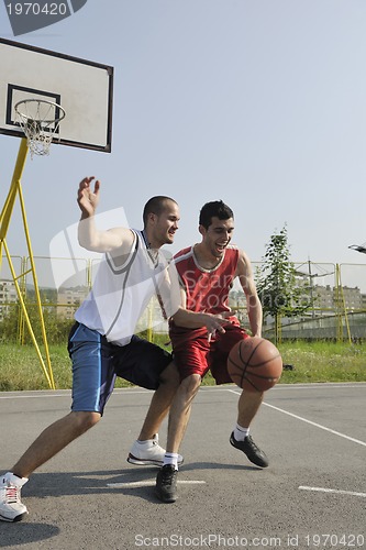 Image of streetball  game at early morning