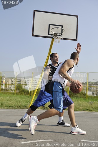 Image of streetball  game at early morning