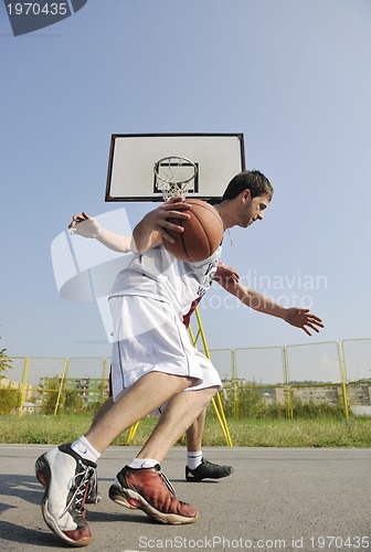 Image of streetball  game at early morning