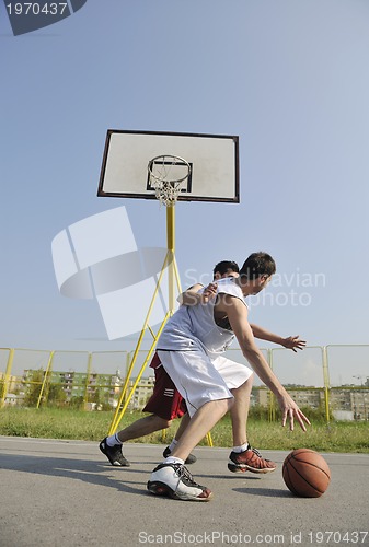 Image of streetball  game at early morning