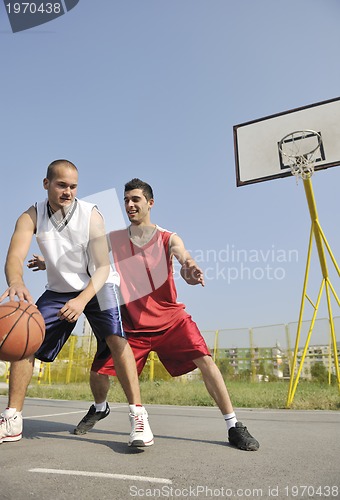 Image of streetball  game at early morning