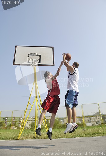 Image of streetball  game at early morning