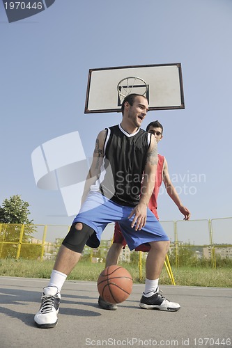 Image of streetball  game at early morning