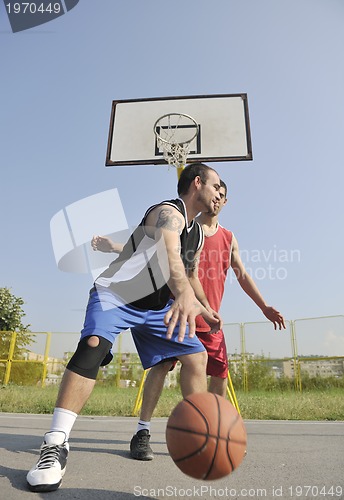 Image of streetball  game at early morning