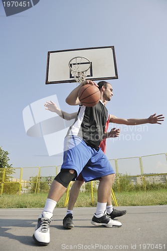 Image of streetball  game at early morning