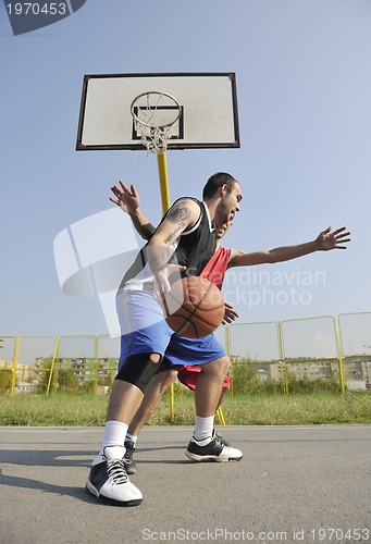 Image of streetball  game at early morning