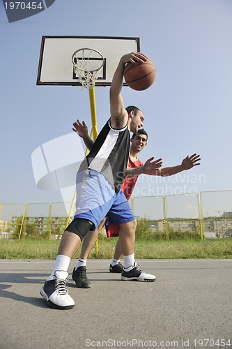 Image of streetball  game at early morning