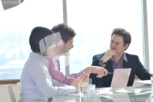 Image of group of business people at meeting