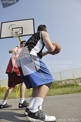 Image of streetball  game at early morning