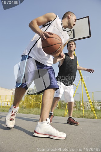 Image of streetball  game at early morning