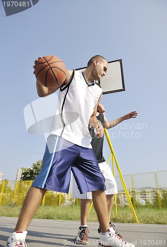 Image of streetball  game at early morning