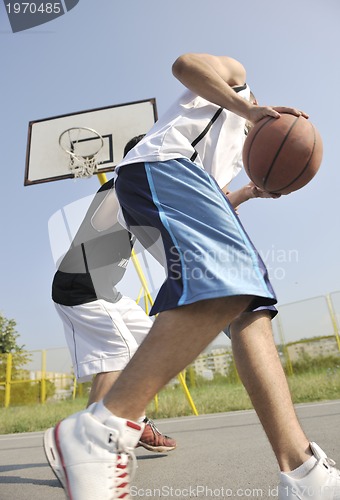 Image of streetball  game at early morning