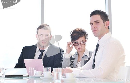 Image of group of business people at meeting