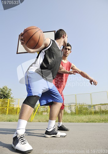 Image of streetball  game at early morning