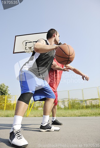 Image of streetball  game at early morning