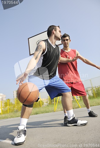 Image of streetball  game at early morning