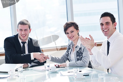 Image of group of business people at meeting