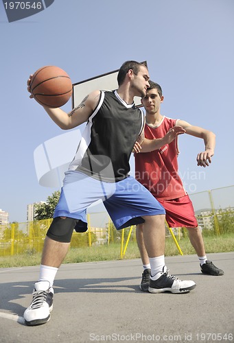 Image of streetball  game at early morning