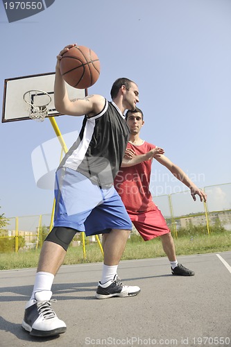 Image of streetball  game at early morning