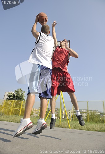 Image of streetball  game at early morning