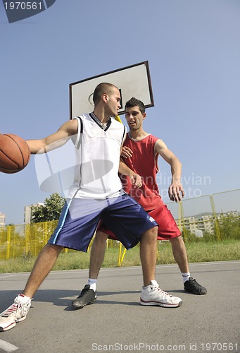 Image of streetball  game at early morning