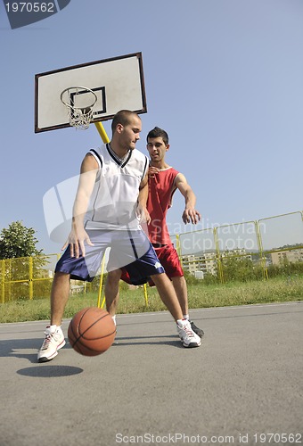 Image of streetball  game at early morning