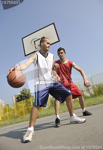 Image of streetball  game at early morning