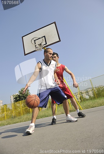 Image of streetball  game at early morning