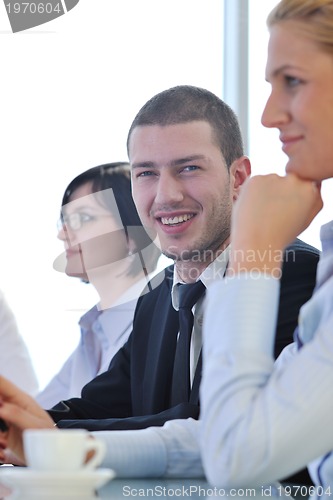 Image of group of business people at meeting