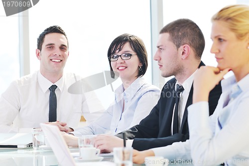 Image of group of business people at meeting