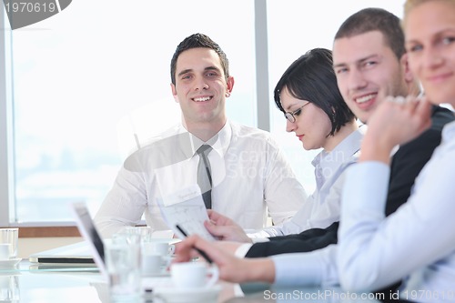 Image of group of business people at meeting