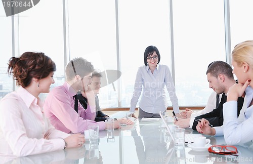 Image of group of business people at meeting