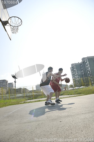 Image of streetball  game at early morning