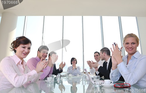 Image of group of business people at meeting