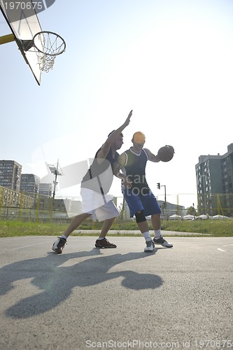 Image of streetball  game at early morning