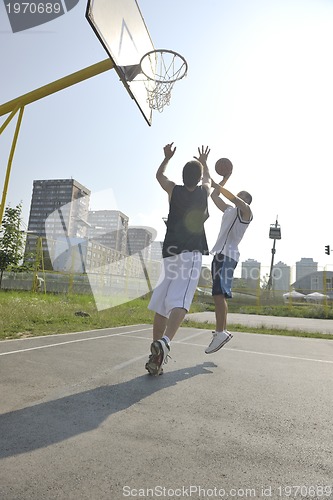 Image of streetball  game at early morning