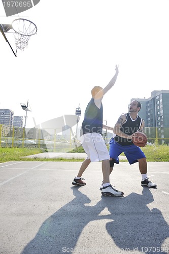 Image of streetball  game at early morning