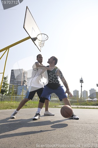 Image of streetball  game at early morning