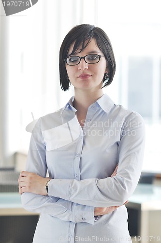 Image of young business woman on meeting