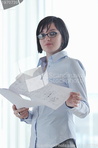 Image of young business woman on meeting