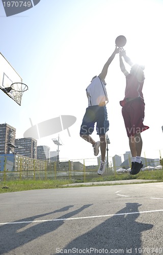 Image of streetball  game at early morning